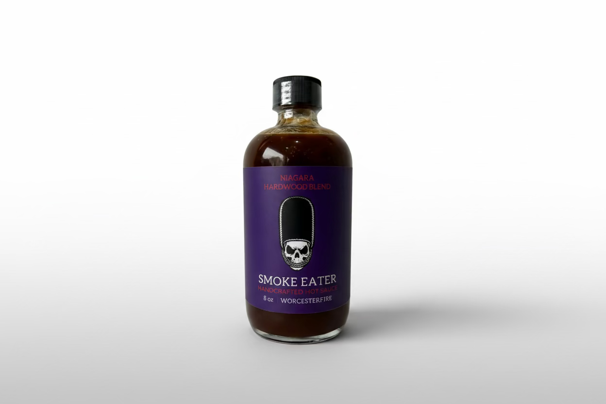 Bottle of Smoke Eater Worcester sauce with a purple label on a white background